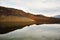 Scenic view of the Azat reservoir in Armenia with the reflection of small hills
