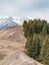 Scenic view from Baiului Mountains with the snowy peaks of Bucegi Mountains.