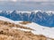 Scenic view from Baiului Mountains with the snowy peaks of Bucegi Mountains. Carpathians in Romania