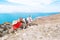 Scenic view of beautiful Dead Sea and a white donkey rising to mountains, Jordan