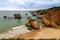 Scenic view of the beautiful Praia do Alemao and the Ponta Joao de Arens in Portimao, Algarve