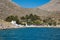 Scenic view of the beautiful Symi Island with traditional buildings in the coastline in Greece