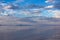 Scenic view of beautiful water reflections in lake of Bonneville Salt Flats at sunset, Wendover, Western Utah, USA, America.