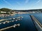 Scenic view of boats in harbor on the tranquil Atlantic ocean in Setubal, Portugal on a summer day