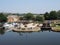 Scenic view of brighouse basin with boats and moorings and the lock gates to the calder and hebble navigation canal in west