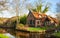 Scenic view on the canal in Giethoorn on a sunny morning, Netherlands