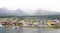 Scenic view of Colourful Town of Ushuaia in the mist. Capital of Tierra del Fuego province in Argentina, South America