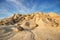 Scenic view of a desertic landscape at sunset in Bardenas Reales, Navarra, Spain.