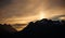 Scenic view of the full moon cresting over the mountain