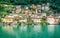 Scenic view of Gandria colorful fishing village houses on the shore of Lake Lugano on beautiful summer day Lugano Ticino