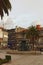 Scenic view of Gomes Teixeira Square with Fountain of Lions, surrounded by palm tree