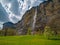 Scenic view of gorgeous Staubbach waterfall in famous Lauterbrunnen valley at spring day, Berner Oberland, Switzerland