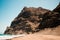 Scenic view of gui gui beach in gran canaria island in spain with spectacular mountains landscape and clear blue sky and sandy