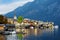 Scenic view of Hallstatt lakeside town in the Austrian Alps on beautiful day in autumn. Hallstatt, situated on Hallstatter See, a