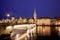 scenic view of historic Zurich city center with famous Fraumunster and Grossmunster Churches and river Limmat at Lake Zurich,