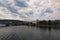 Scenic view of historical center of Prague, Manes Bridge and Vltava river at cloudy summer day