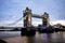 Scenic view of the illuminated London Bridge and River Thames In the evening with a cloudy sky above