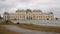 Scenic view of impressive Baroque building of upper palace in Belvedere complex in Vienna, Austria on murky winter day