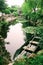 A scenic view inside a classical Chinese garden of an ancient Chinese mansion.