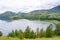 Scenic view of lake againts mountain and sky