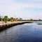 Scenic view of lakeside against sky