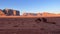 Scenic view of the landscape of Wadi Rum desert with tire tracks in Jordan