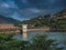 Scenic view of Lavasa city reservoir under the cloudy sky
