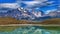 Scenic view of the majestic mountains and tranquil lake in Torres del Paine National Park.