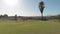 Scenic view of male golf player driving golf cart at the golf course