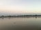 Scenic view of Mekhong River with a little boat in Nong Khai, Thailand