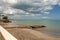 Scenic view of the MIches bay in the Dominican Republic; green sea, boats, clouds