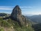 Scenic view from the Mirador de Roque Agando massive volcanic rock formation Roque de Agando in Garajonay National Park