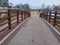 Scenic view of modern bridge with a wooden deck walkway
