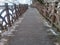 Scenic view of modern bridge with a wooden deck walkway