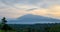 Scenic view of Mount Cameroon mountain with green forest during sunset, Cameroon, Africa