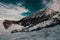 Scenic view of mountain Hohes Brett covered by snow under dramatic blue sky