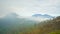 A scenic view of mountaineous terrain from the top of Ijen mountain in Banyuwangi, Indonesia