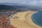 Scenic view of Nazare beach. Coastline of Atlantic ocean. Portuguese seaside town on Silver coast. White houses with red tiled