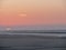 Scenic view of the North Sea beach in Juist island, Germany at a pinky sunset