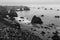 A scenic view of the northern Californian coastline at Bodega Bay. Shot in black and white and with a long exposure.