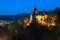 Scenic view over Dracula Bran medieval castle at night, Bran town, Transylvania regio, Romania