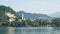 Scenic view over Lake Bled, Julian Alps and church, sunny day, Bled, Slovenia