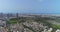 Scenic view over Tel Aviv green skyline, High rise drone from residential houses over green Central park and pond in the