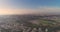 Scenic view over Tel Aviv green skyline, High rise drone from residential houses over green Central park and pond in the