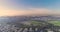 Scenic view over Tel Aviv green skyline, High rise drone from residential houses over green Central park and pond in the