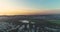 Scenic view over Tel Aviv green skyline, High rise drone from residential houses over green Central park and pond in the