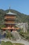 Scenic view of pagoda of Seiganto-ji Temple with Nachi no Taki waterfall in background at Nachi Katsuura, Wakayama, Japan