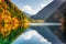 Scenic view of the Panda Lake. Autumn forest reflected in water