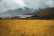 Scenic view of Phobjikha valley on a cloudy day in Bhutan, landscape with clouds over the mountains.