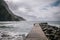 Scenic view of a pier jutting out into the ocean with dramatic cliffs La Gomera, Spain